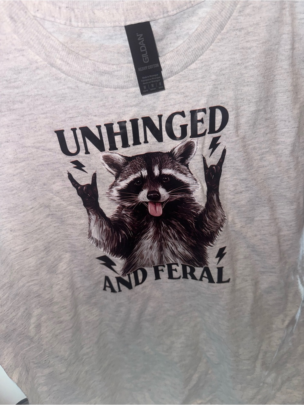 Gildan Light Gray Graphic Tee 'Unhinged and Feral' with Raccoon Print